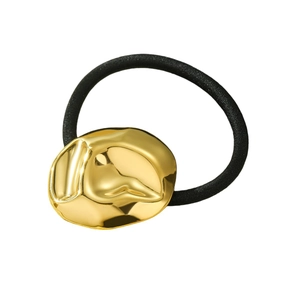 Minimalist elastic hair tie with gold irregular lava textured metal charm on white background