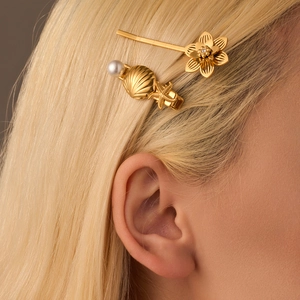 Set de barrettes dorées avec fleurs diamantées, étoile de mer et perle blanche