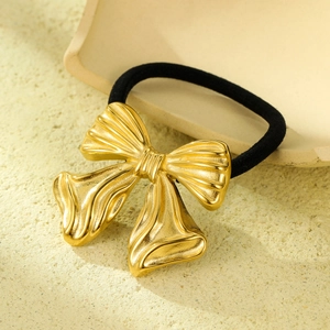 Elegant gold bow hair tie with high elastic black band and luxury metallic finish