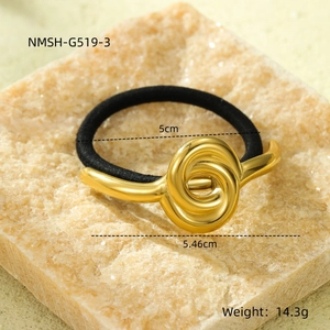Close-up of geometric 18K gold knot hair tie with measurements 5.46cm and 5cm diameter