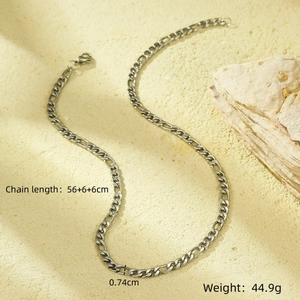 Close-up of Figaro chain necklace showing 0.74cm width and 56+6+6cm length specs
