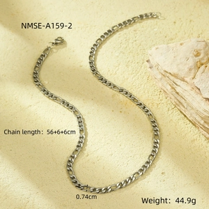 Detailed view of silver Figaro chain necklace with dimensions 56+6+6cm on stone