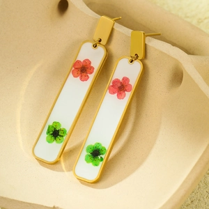 Gold plated geometric rectangular earrings with real red and green dried flowers
