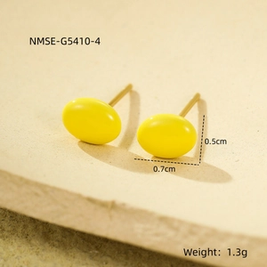 Close-up of yellow oval stud earrings on stone base showing 0.7cm size and 1.3g weight