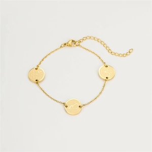 Bracelet en acier doré avec trois pendentifs circulaires gravés en arabe sur chaîne à maillons