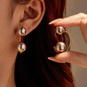 French style dual pearl stainless steel earrings with gold hollow geometric design