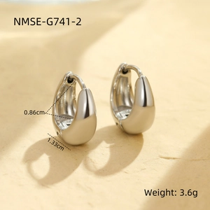 Polished silver teardrop earrings measuring 1.33cm by 0.86cm with minimalist design