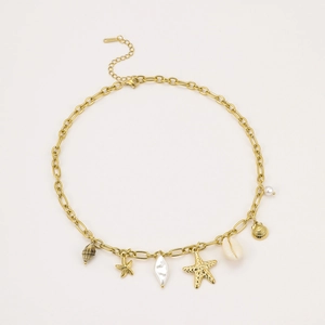 Close-up of gold starfish and seashell charms on a stainless steel necklace chain