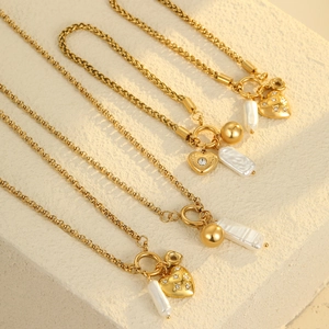 Luxurious gold stainless steel necklaces with baroque pearl and diamond heart pendants