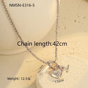 Detail of a 42cm stainless steel heart pendant necklace with white pearl on stone