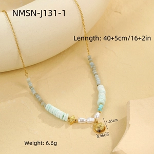 Detail of 18k gold ocean style necklace with blue beads and shell pendant