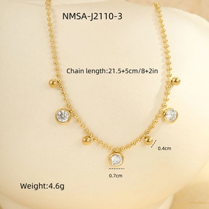 Detail view of gold bead anklet with clear crystal pendants and size measurements