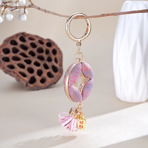 Handmade Song cotton pearl gourd keychain with pink tassel and lucky metal charm