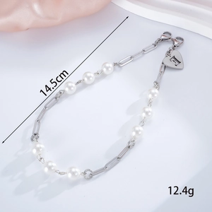 Silver stainless steel hand chain with white pearls and heart pendant engraved with letter E