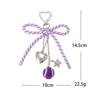 Paarse nylon strik sleutelhanger met hart- en sterbedeltjes en mini-tennisballetje
