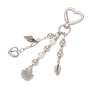 Silver ocean themed heart charm keychain with shells and pearls for bags and phones