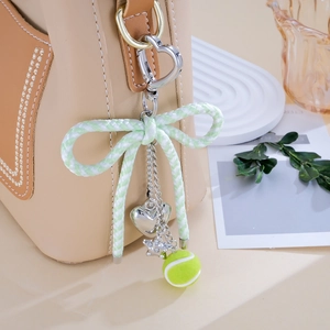 Nylon strik sleutelhanger met hartvormige hanger en mini tennisbal voor tassen