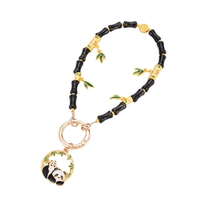 Bamboo style beaded phone strap with cute panda charm and Chinese character detail