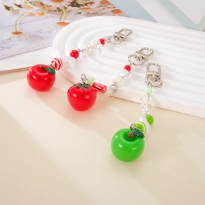 Handmade strawberry and apple beaded phone charms with resin fruits and silver lobster clasps
