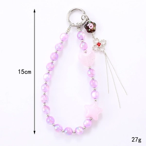 Bijou de téléphone trèfle 15cm avec perles irisées, pampille et cœurs roses
