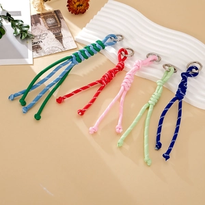 Handmade woven nylon paracord keychains in multiple colors with metallic rings