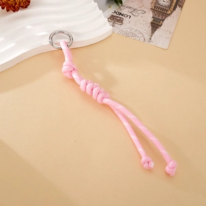 Handmade pink nylon rope pendant with knot design and silver metal clasp detail