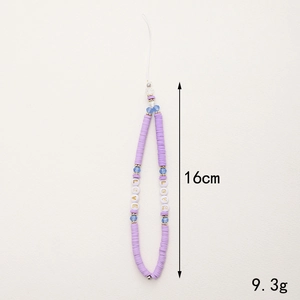 Handmade polymer clay phone wrist strap with purple beads and golden LOVE letters