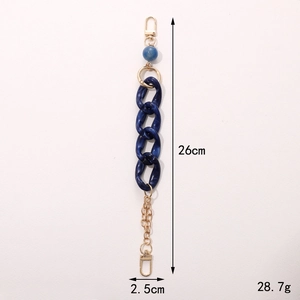 Acrylic handbag chain strap with blue marble pattern links and gold lobster clasp