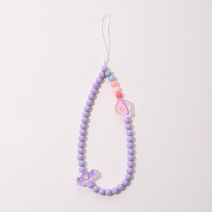 Beaded purple phone charm strap with sweet macaron accents and resin pendants