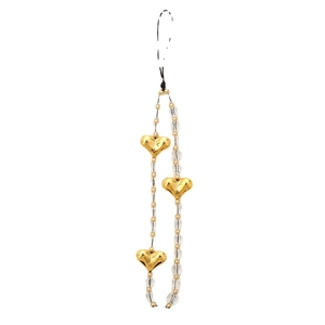 Handmade crystal phone wrist strap with gold hearts and transparent beads on a white base