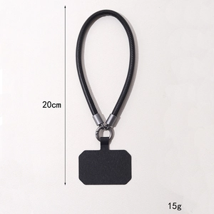 Durable black leather braided phone wrist strap with metal ring and tether tab