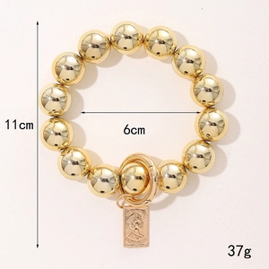 Bracelet à perles dorées polies avec pendentif pièce portrait et diamètre de 11cm