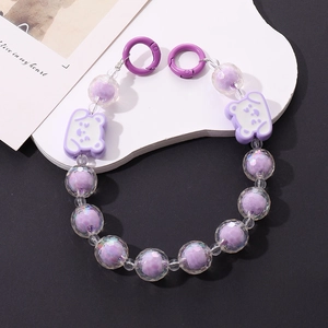 Close-up of purple acrylic bead chain featuring cute bear charms and dual spring ring clasps