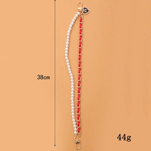 Elegant 38cm double-strand phone chain with pearls, red ribbon, and heart bow charm