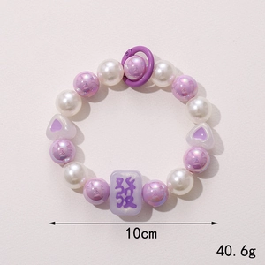 Handmade beaded bracelet with purple heart charms and Mahjong Fa lucky pendant