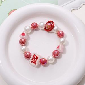 Handmade pearl and pink heart bead phone strap with Mahjong Fa character pendant charm