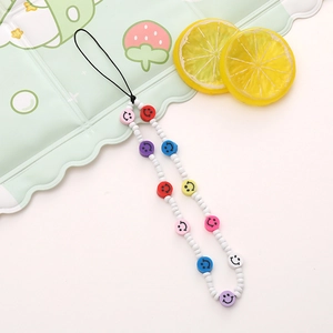 Colorful smiley face beaded wrist strap for phone cases with white round beads and charms