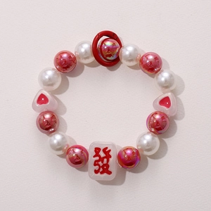 Pink heart and pearl beaded phone wristlet with Mahjong lucky charm and red clip