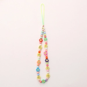 Colorful beaded phone charm with macaron beads and smiling flower pendant wrist strap