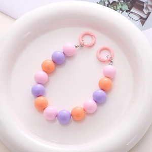 Detail of 16mm macaron colored acrylic bead chain with pink circular plastic hooks