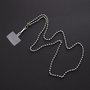 Macro shot of silver beaded metal chain strap and clear phone case connector patch
