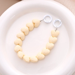 Creamy yellow faceted heart beaded chain with white spring rings for phone and bags