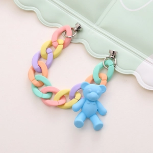 Detail of macaron acrylic phone chain with blue matte bear charm and magnetic clasp