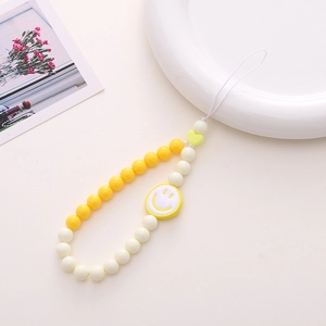 Handmade acrylic beaded phone lanyard with yellow smiley face and heart beads