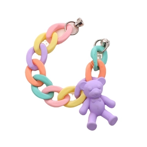 Colorful macaron acrylic link chain with a matte purple bear pendant on a white background