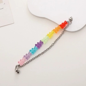 Detail of colorful resin bears with silver metal chain for DIY phone cases