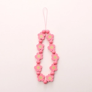 Pink wooden flower beaded phone charm strap with wrist loop for case decoration