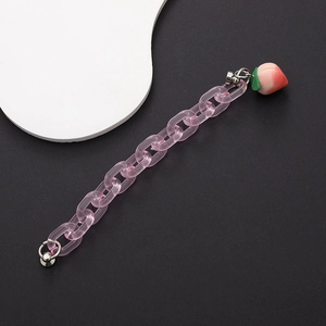 Pink translucent acrylic phone strap with peach charm and metal magnetic clips
