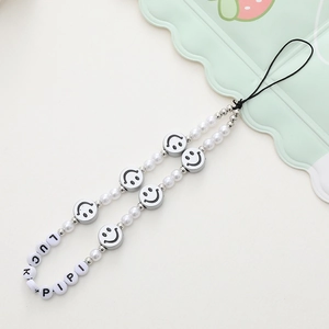 Acrylic bear beaded phone strap with white pearls and smiley face charm wristlet