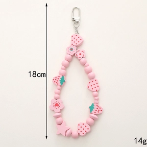 Pink wooden bead keychain with strawberry and flower charms measuring 18cm and 14g